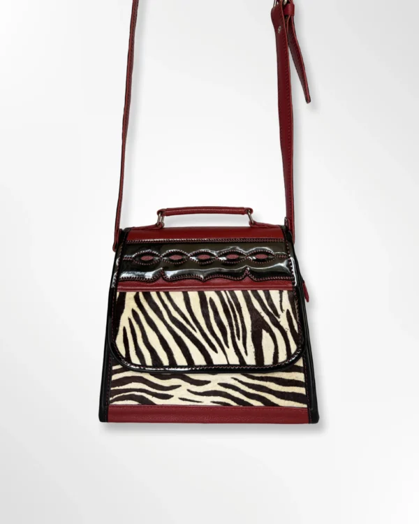 Cartera manos libres para dama en cuero animal print Tania rojo animal print 2