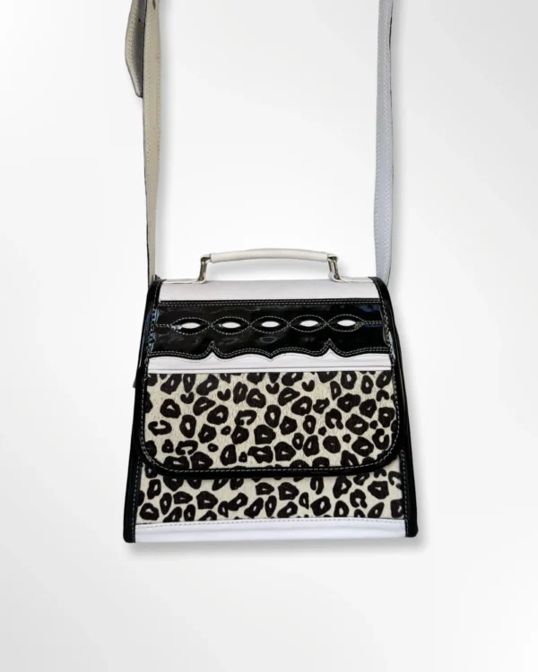 Cartera manos libres para dama en cuero animal print Tania blanco animal print 1